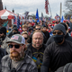 Alex Jones stands in a crowd of Trump protesters during a December, 2020 protest over the election results in Washington D.C.